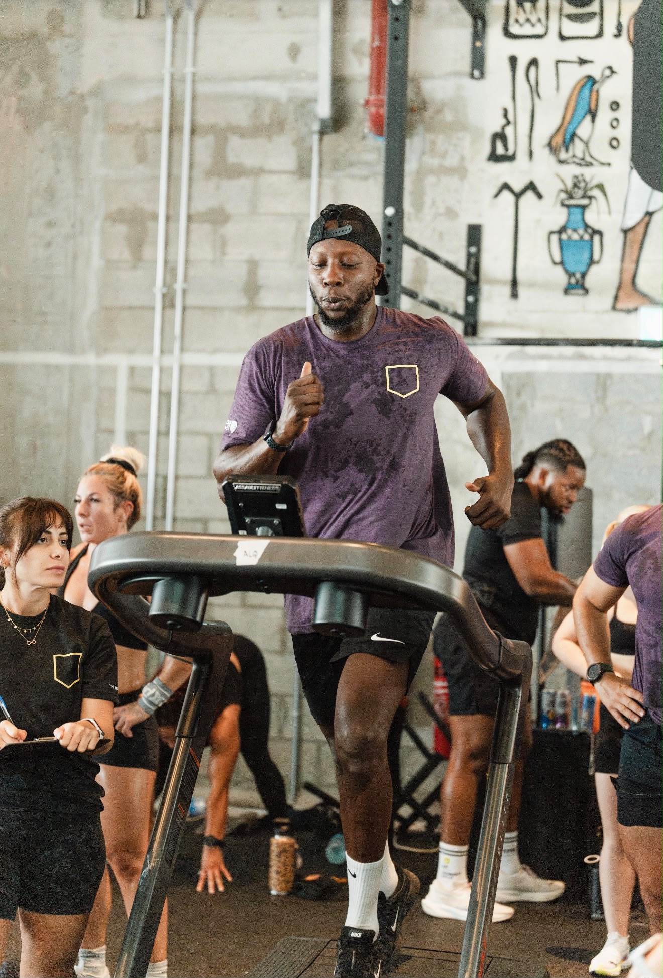 Pat Layi leading a high-energy workout session